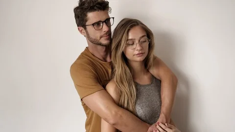 Couple in glasses in studio Stock-Footage 93827804