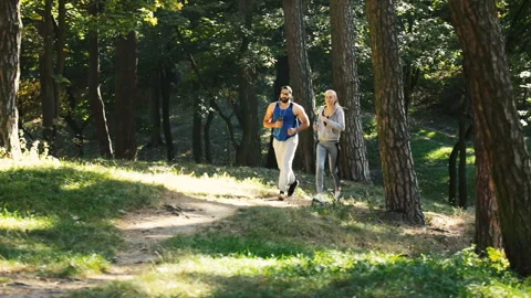 Couple Goes Jogging in Park 動画素材 101539535
