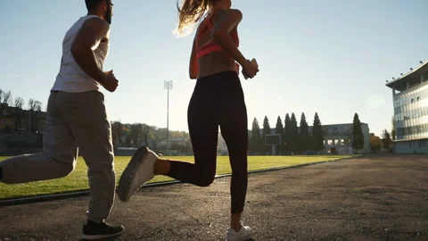 Couple Goes Jogging in Stadium 動画素材 101541835
