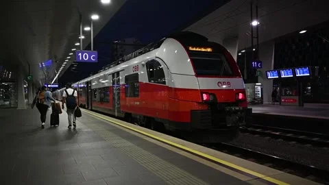 The couple goes to the QBB train Stock Footage 252126438