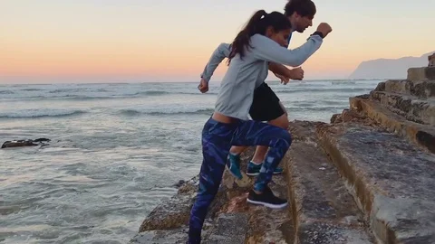 Couple going up and down steps for strength training Stock Footage 76521615
