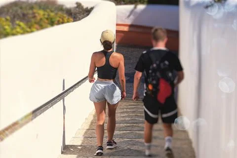 A couple going down to the beach Stock Photos