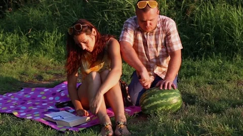 Couple going eating watermelon Stock Footage 46952836