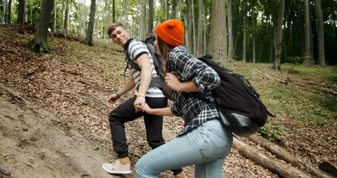 Couple Going Uphill in Forest 動画素材 115301963