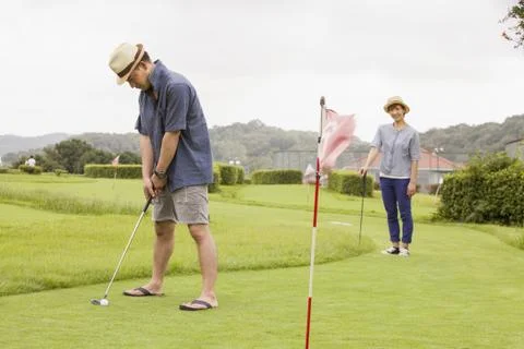Couple on a golf course. Fotos Stock