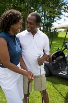 Couple Golfing Stock Photos