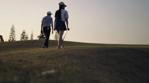 Couple Golfing player talking about nice shot in golf course Video stock 123075266