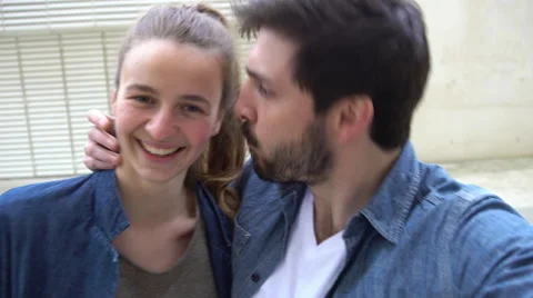 Couple goofing off together while posing for a selfie Stock Footage 63289040