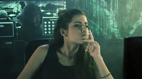 Couple of hackers coding  committing crime closeup 스톡 동영상 86178183