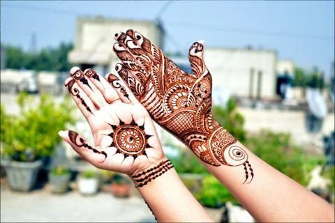 Couple of hands designed by beautiful mehendi Stock Photos