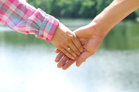 Couple hands Stock Photos