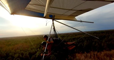 Couple Hang Gliding at Sunset, Close-Up, Gopro Glider Stock Footage 105821033