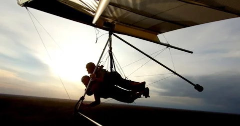 Couple Hang Gliding at Sunset, Close-Up, Gopro Glider Stock Footage 105821041