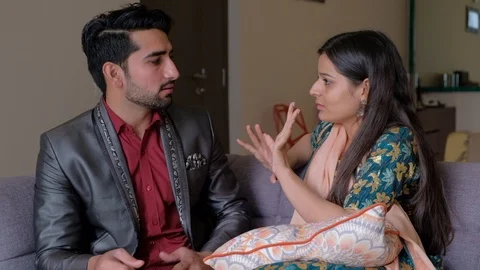 Couple having animated discussion and arguments with each others over disagreeme Stock Footage 101335969