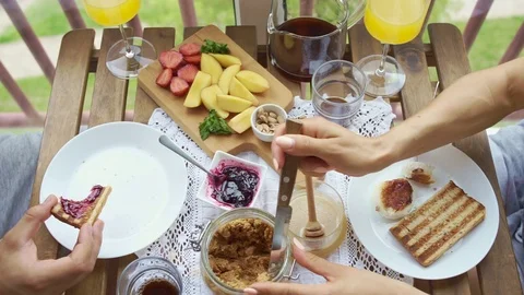 Couple having Breakfast on the balcony. Stock-Footage 91256754
