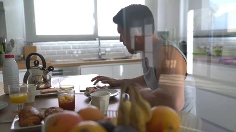 Couple having breakfast in home kitchen Video stock 72009844