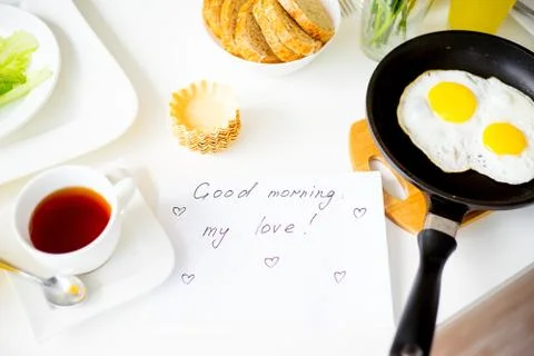 Couple having breakfast Stock Photos
