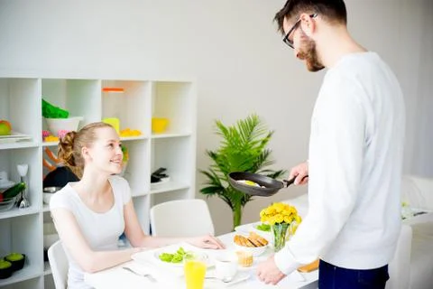 Couple having breakfast Stock Photos