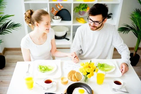 Couple having breakfast Stock Photos