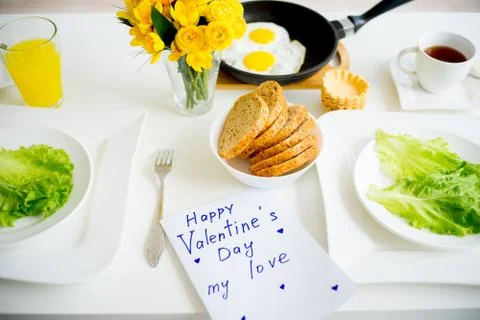 Couple having breakfast Stock Photos