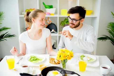 Couple having breakfast Stock Photos