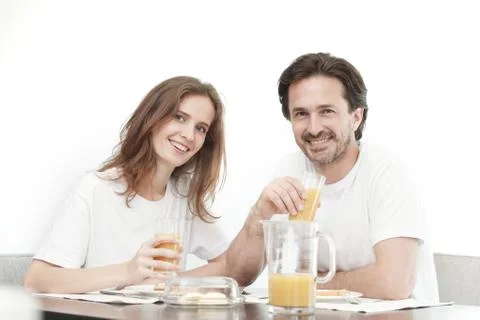 Couple having breakfast Stock Photos