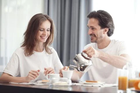 Couple having breakfast Stock Photos