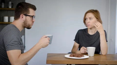 Couple having coffee with biscuits Stock Footage 93857299
