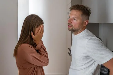 Couple Having Difficult Conversation or Argument at Home Stock Photos