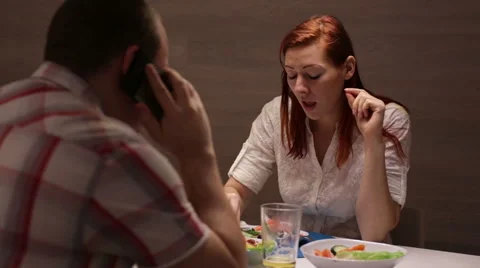 A couple having dinner at the table. Video stock 58110457