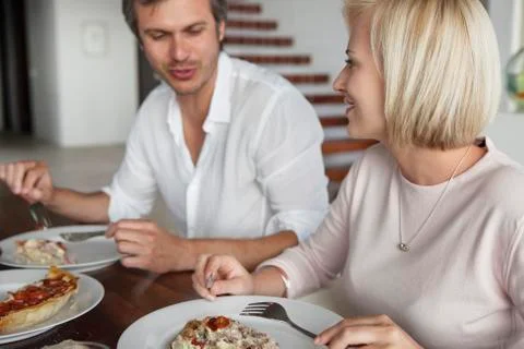 Couple having food Stock Photos
