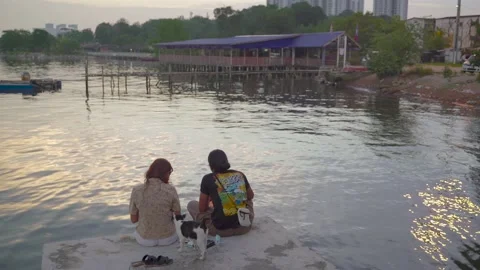 Couple Having Foods by the Sea Stock Footage 157443937