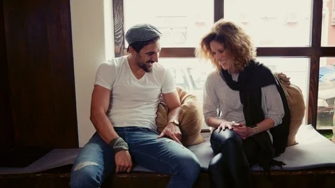 Couple having fun and laughing in cafeteria Stock Footage 95909106