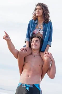 Couple having fun on beach 스톡 사진
