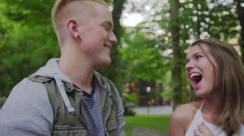 Couple having fun in a park together Stock Footage 54259687