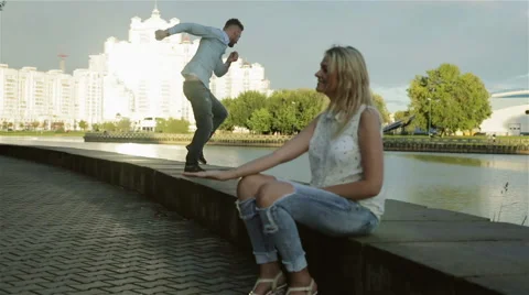 A couple having fun at the river side Stock Footage 66187309