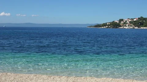 Couple Having Fun Running Along Summer Adriatic Beach Together. Woman catching Stock Footage 113211543