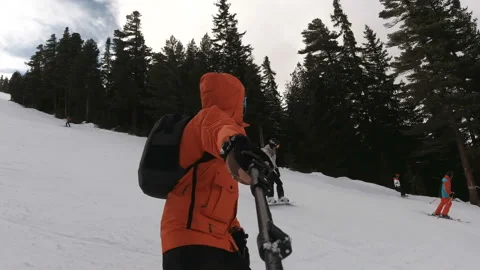 Couple having fun on snowboards at winter day Stock Footage 146372243