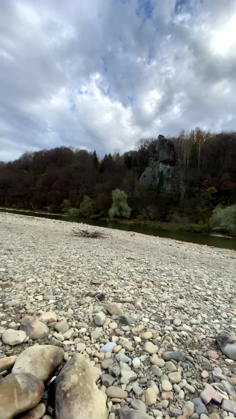 Couple having picnic at mountain river beach autumn fall season Stock Footage 221546874