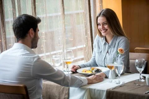 Couple having romantic dinner Stock Photos