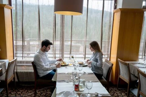 Couple having romantic dinner Stock Photos