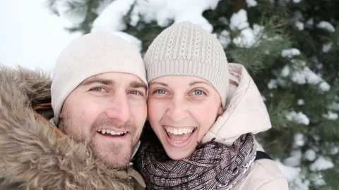 Couple having a selfie on the snow Stock Footage 70022131