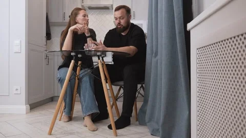 Couple having a serious conversation at home Stock Footage 317441696