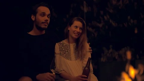 Couple having a talk at a fireplace Stock Footage 103152472