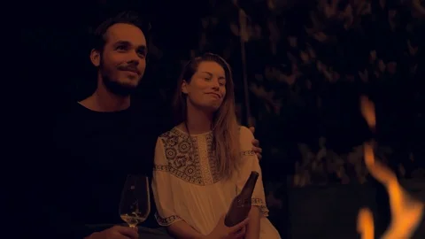 Couple having a talk at a fireplace Stock Footage 103152487