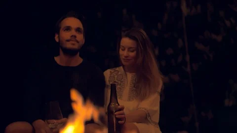 Couple having a talk at a fireplace Stock Footage 103152549