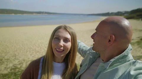 Couple having video chat on beach Stock-Footage 107402133
