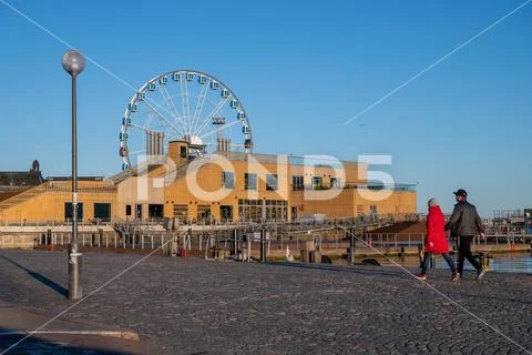 A couple having a walk in downtown Stock Photos