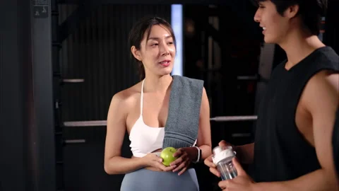 Couple of healthy man and woman exercisi... | Stock Video | Pond5