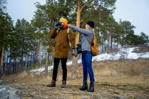 Couple hiking in forest Stock Photos